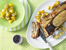 Aubergine pie with roast potatoes