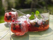 Summer berry punch with champagne and limes