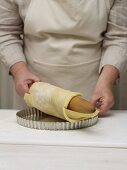 Line baking tin with shortcrust pastry