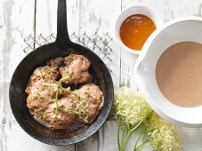 Deep-fried elderflowers with apricot pulp