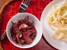 Red onion and bacon sauce with tagliatelle