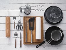 Various kitchen utensils for making a tart