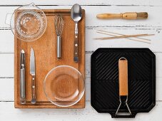 Various kitchen utensils for making grilled food