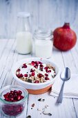 Muesli with pomegranate, yoghurt and almonds