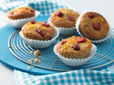 Orange muffins with cherries