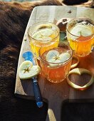 Hot apple cider with heart-shaped apple slices