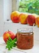 Apple and mint jam in a glass jar