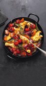 Braised chicken with vine tomatoes, apricots and saffron