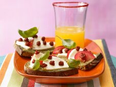 Bread with a mozzarella topping with orangeade