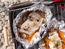 Grilled ling with mushrooms and carrots