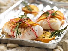 Grilled cod fillets with rosemary and orange