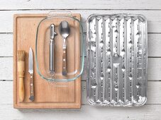 Kitchen utensils for preparing fish fillets with curry and ginger