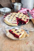 Sliced cherry lattice pie