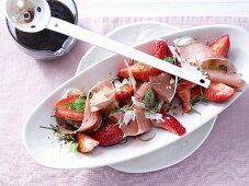 Savoury strawberries with ham and balsamic and honey syrup