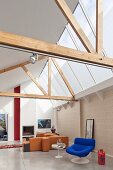 Modern living room with open roof structure and glass roof