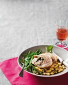 Saddle of lamb with white and green beans