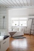 Comfortable living room in wooden cabin