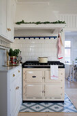 Vintage-style AGA cooker in Swedish country-house kitchen