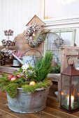 Vintage Christmas decorations on veranda outside wooden house