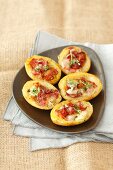 Baked potatoes filled with bacon and mozzerella