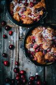 Bread pudding made of croissants with cranberries and sugar
