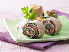 Pancake rolls with savoy cabbage and Parma ham