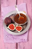 Fig jam in a bowl with a spoon