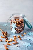 Spiced nuts in a jar for Christmas