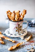 Puff pastry straws with smoked paprika and maple syrup for Christmas