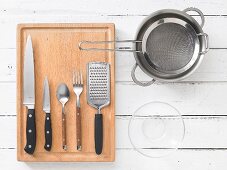 Kitchen utensils for preparing fish and potatoes