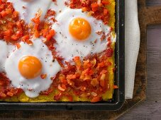 Mexican-style polenta pizza with red pepper salsa and egg