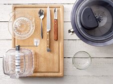 Utensils for preparing juices: a juicer, ice crusher and citrus press