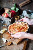 Apple and frangipane tart with cinnamon in a pastry case