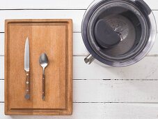 Kitchen utensils: juicer, knife and spoon