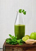 Celery, apple and spinach juice with lime and ginger