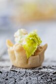 Chicken salad with celery and sweetcorn served in pastry bowls