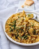 Pasta with herbs, anchovies, garlic butter and Parmesan