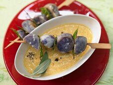 Potato and bay leaf skewers with a carrot and sage dip