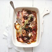 Gratinated salmon with goat's cheese, nuts and blackcurrants