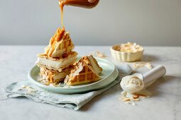 Waffle ice cream sandwiches with caramel sauce