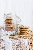 Chocoöate chip cookies in a storage jar and next to it