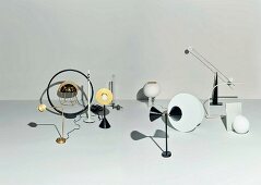 Various designer table lamps casting shadows