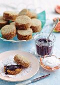Fig and date scones with blueberry chia jam and coconut cream