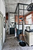 Industrial-style loft apartment with glass and steel partition walls