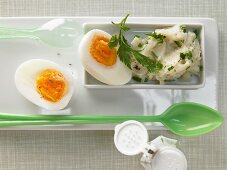 Egg with a vegetable and parsley dip