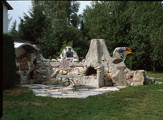Barbecue area with mosaic and bird head