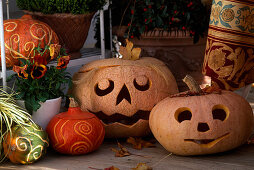 Halloween: hollowed out decorative pumpkins with carved patterns