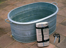Zinc tub as water basin for children