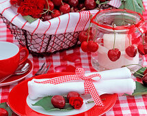 Prunus avium (sweet cherries), pink (red roses), basket, lantern