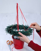 Hanging wreath in a red pot (3/5)